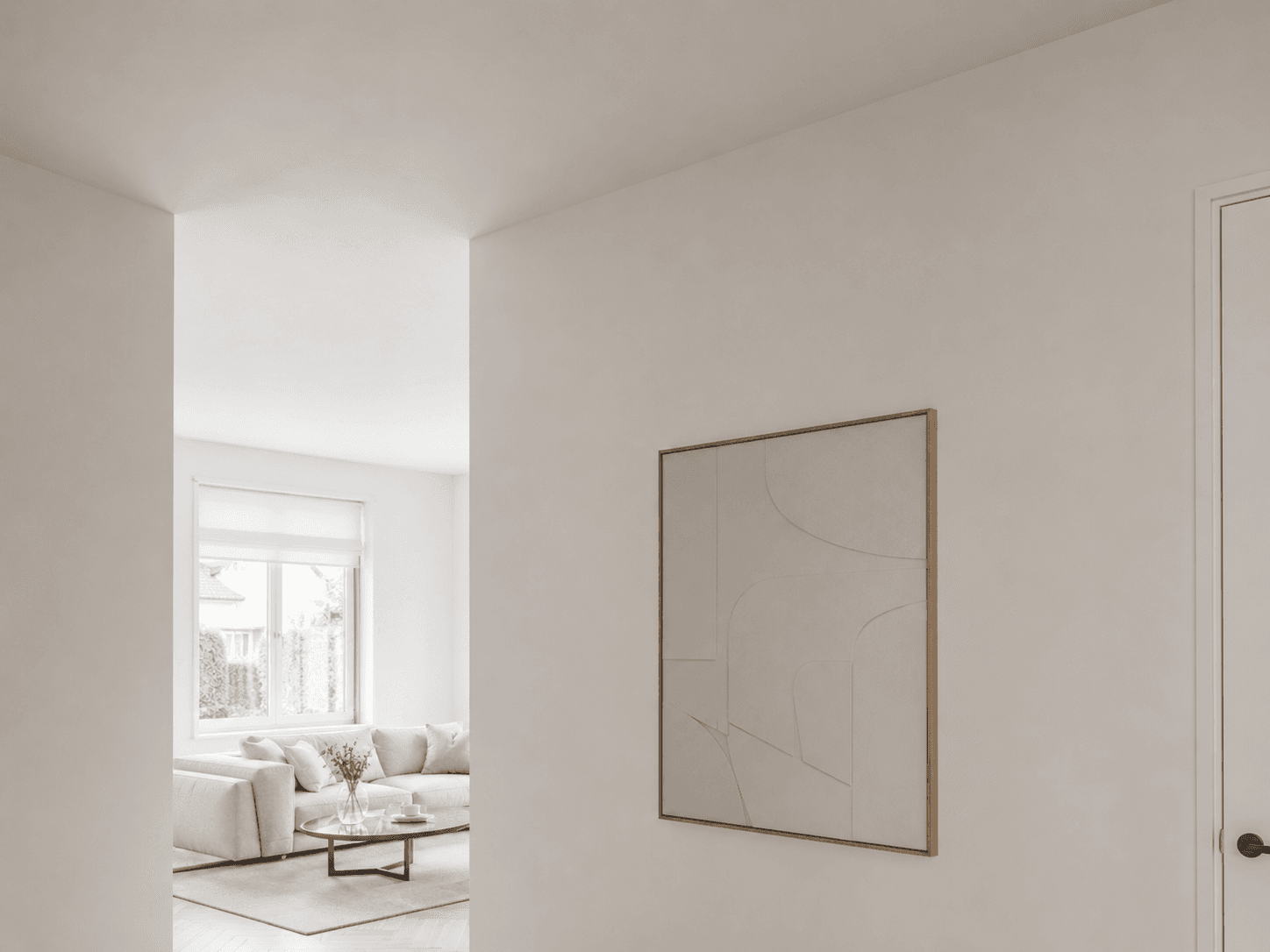 Glad gestucte wand en plafond in een woning